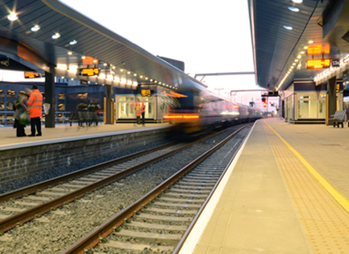 Railway platorm with a train approaching