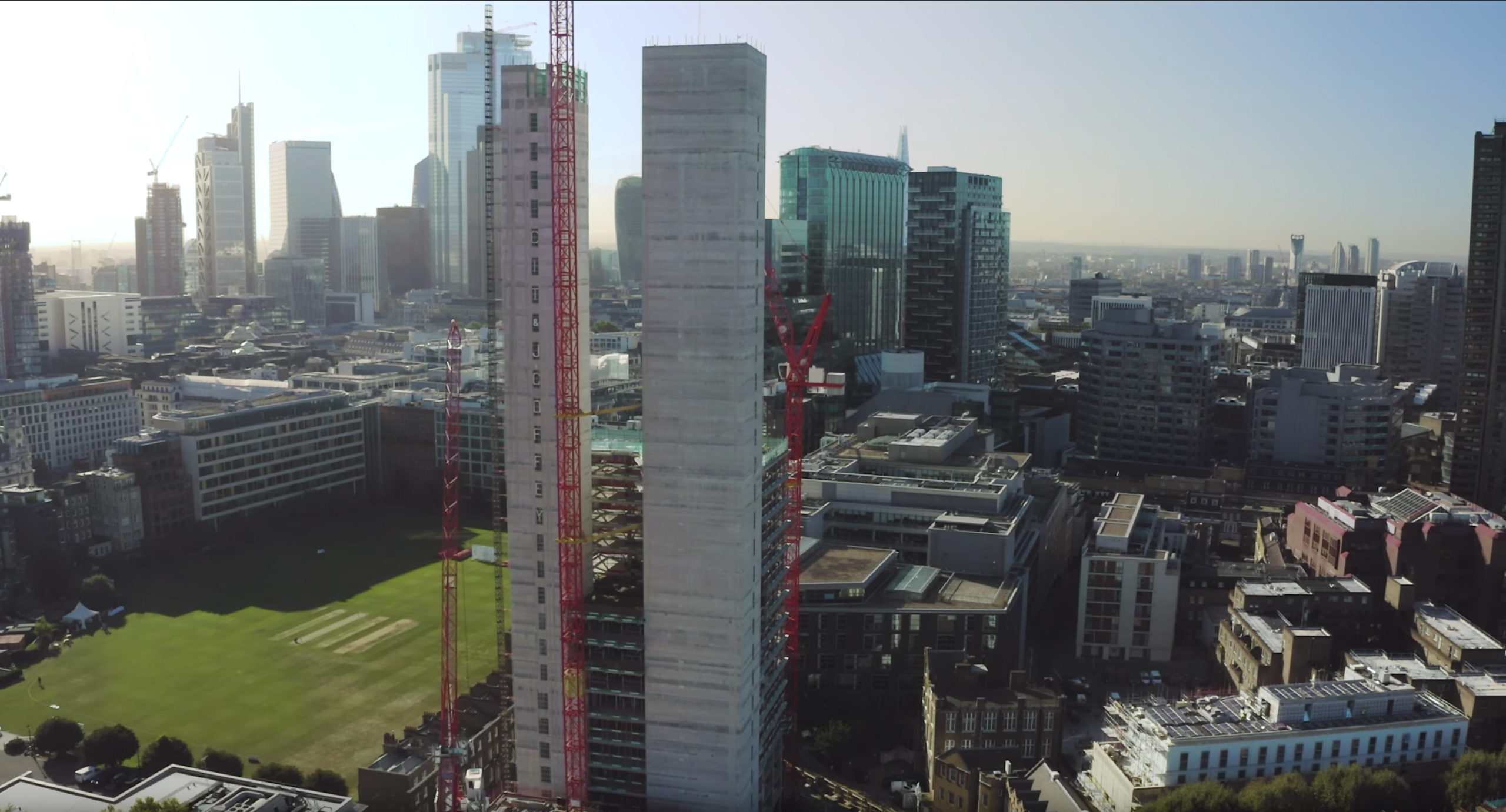 J Coffey construction workers examining project information on site